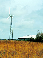 Farm landscape with small wind turbine